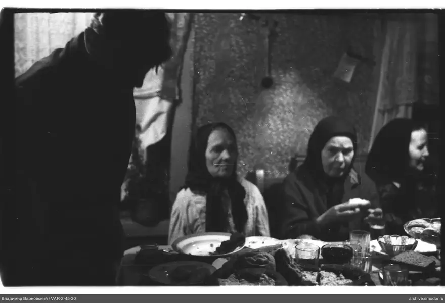 Women and man at a table