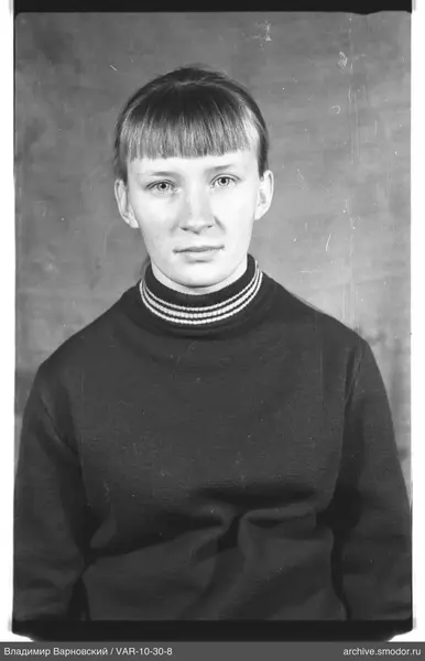 Portrait of a woman in a dark sweater