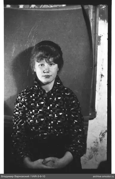 Portrait of a woman with a geometric shirt