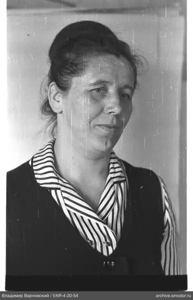 Portrait of a woman with pulled-back hair
