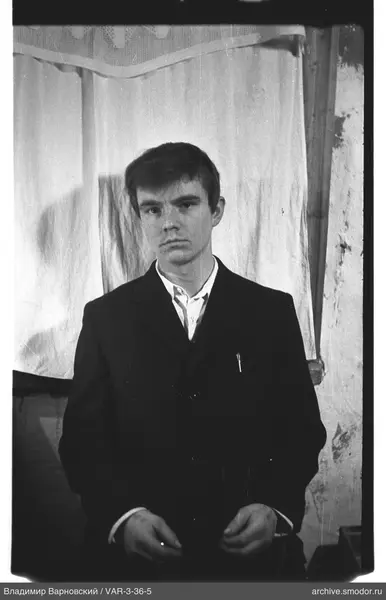 Man in suit with pen
