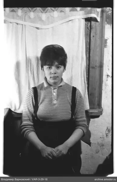 Portrait of a woman in a striped sweater