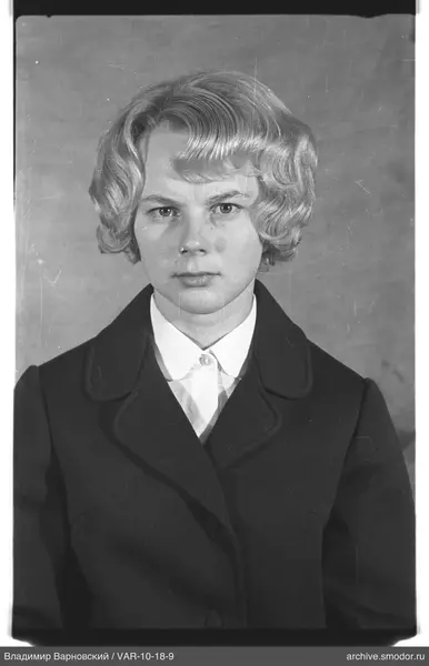 Portrait of a woman in dark coat