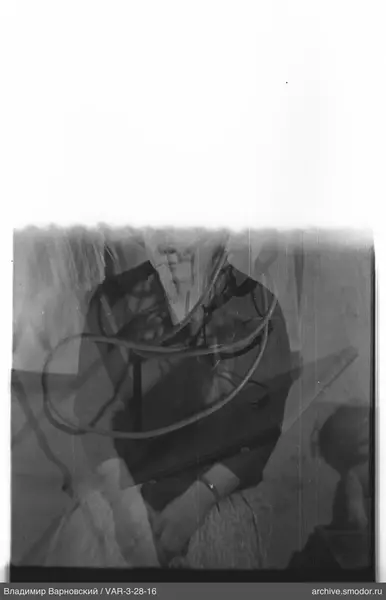 Portrait of a woman in dark top and light skirt