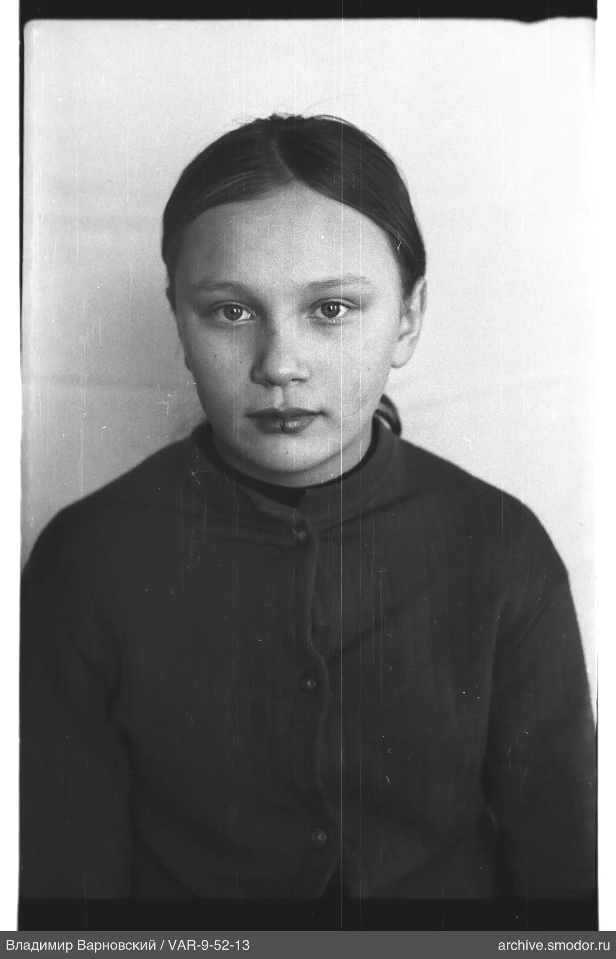 Girl's portrait with pulled-back hair