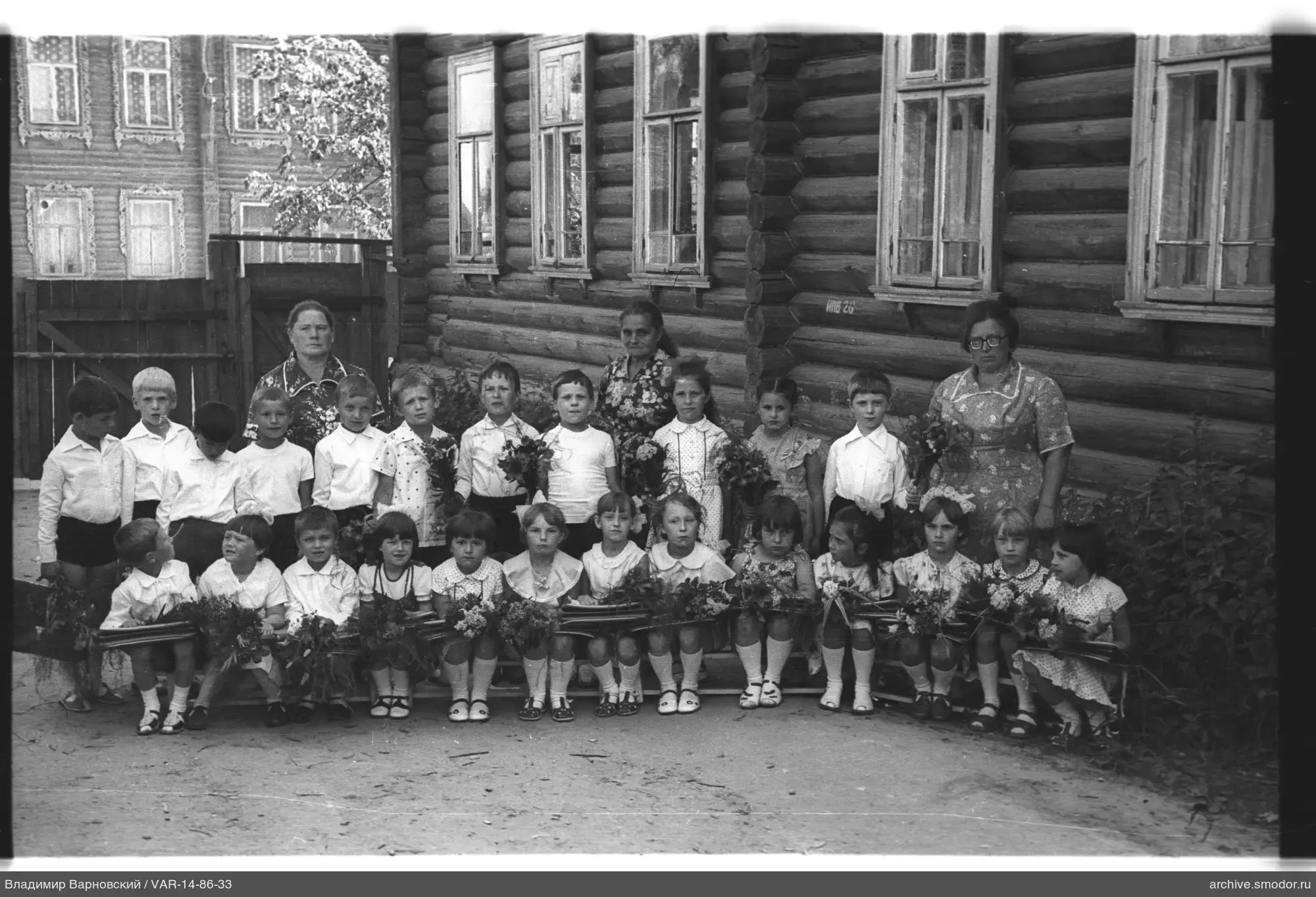 Group portrait of children and women