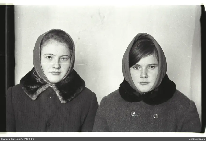 Two women in coats with fur collars