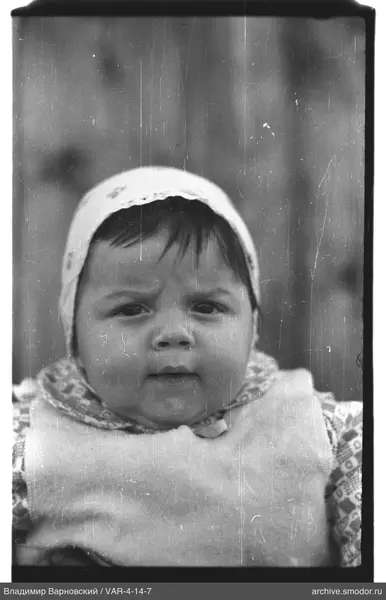 Child portrait with patterned headdress