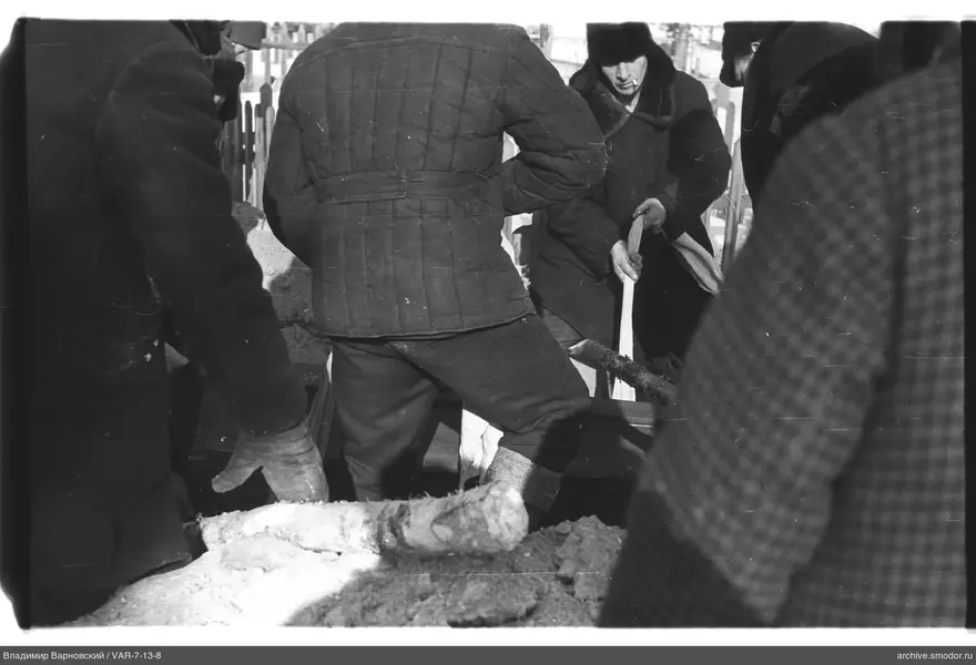 Men around a wooden box