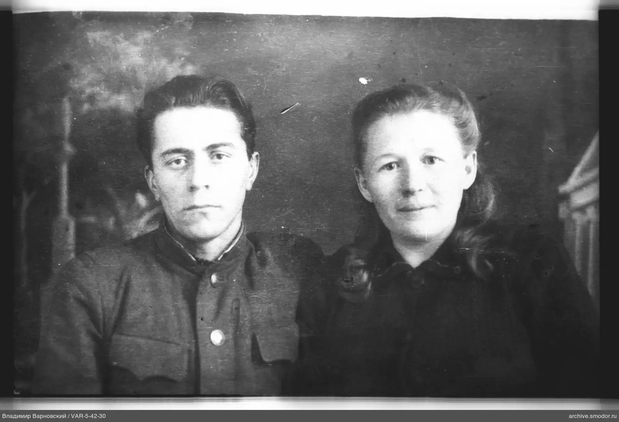 Портрет мужчины в военной форме и женщины