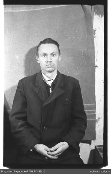 Man in coat and shirt