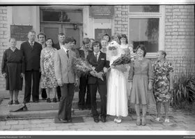 Group portrait with bride and groom