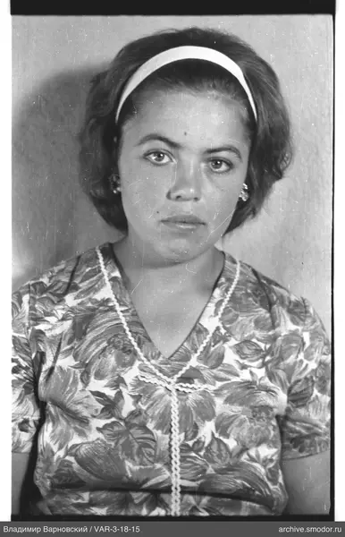 Portrait of a woman in a patterned dress