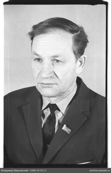 Portrait of a man with badge