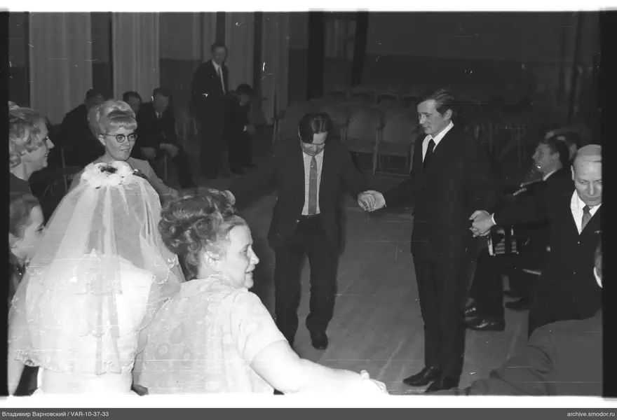 Group of people forming a circle at an event