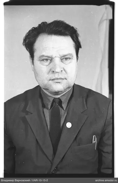 Portrait of a man in a dark suit