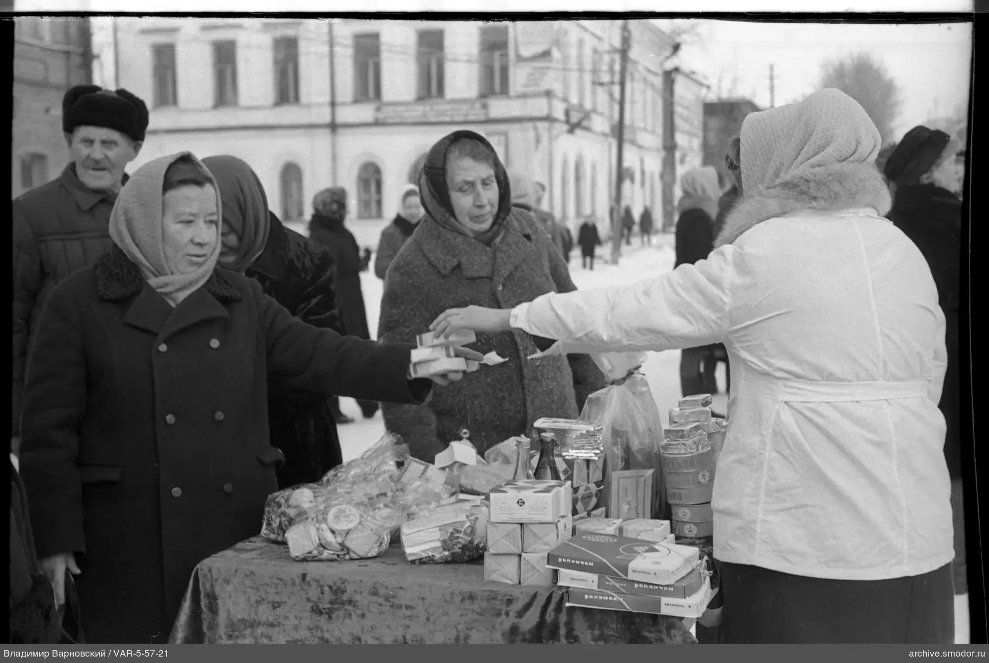 People at a goods counter