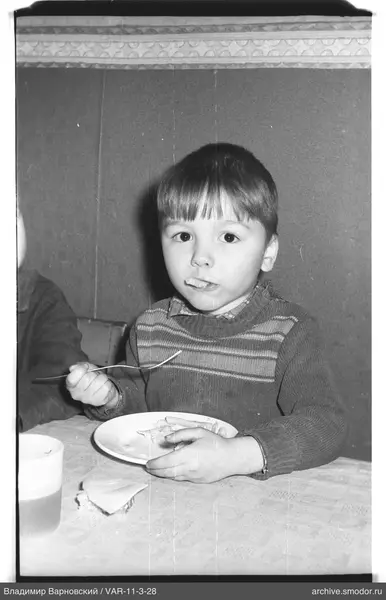 Portrait of a boy at the table