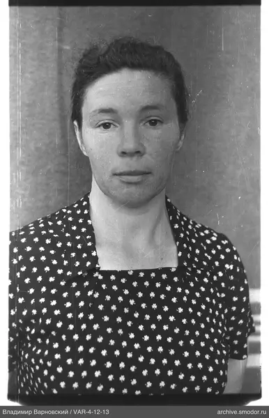 Portrait of a woman in a dark dress