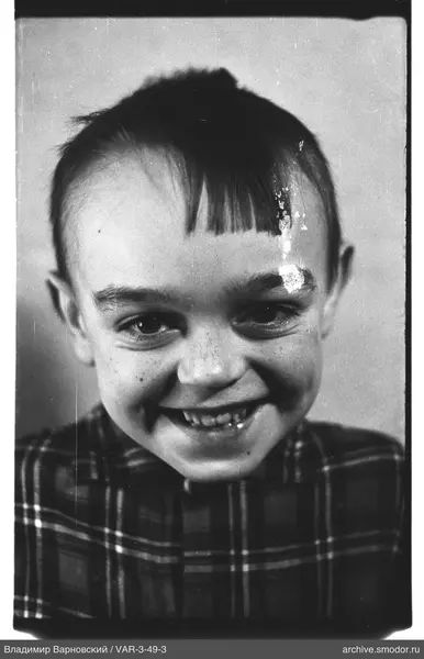 Child portrait in checkered shirt