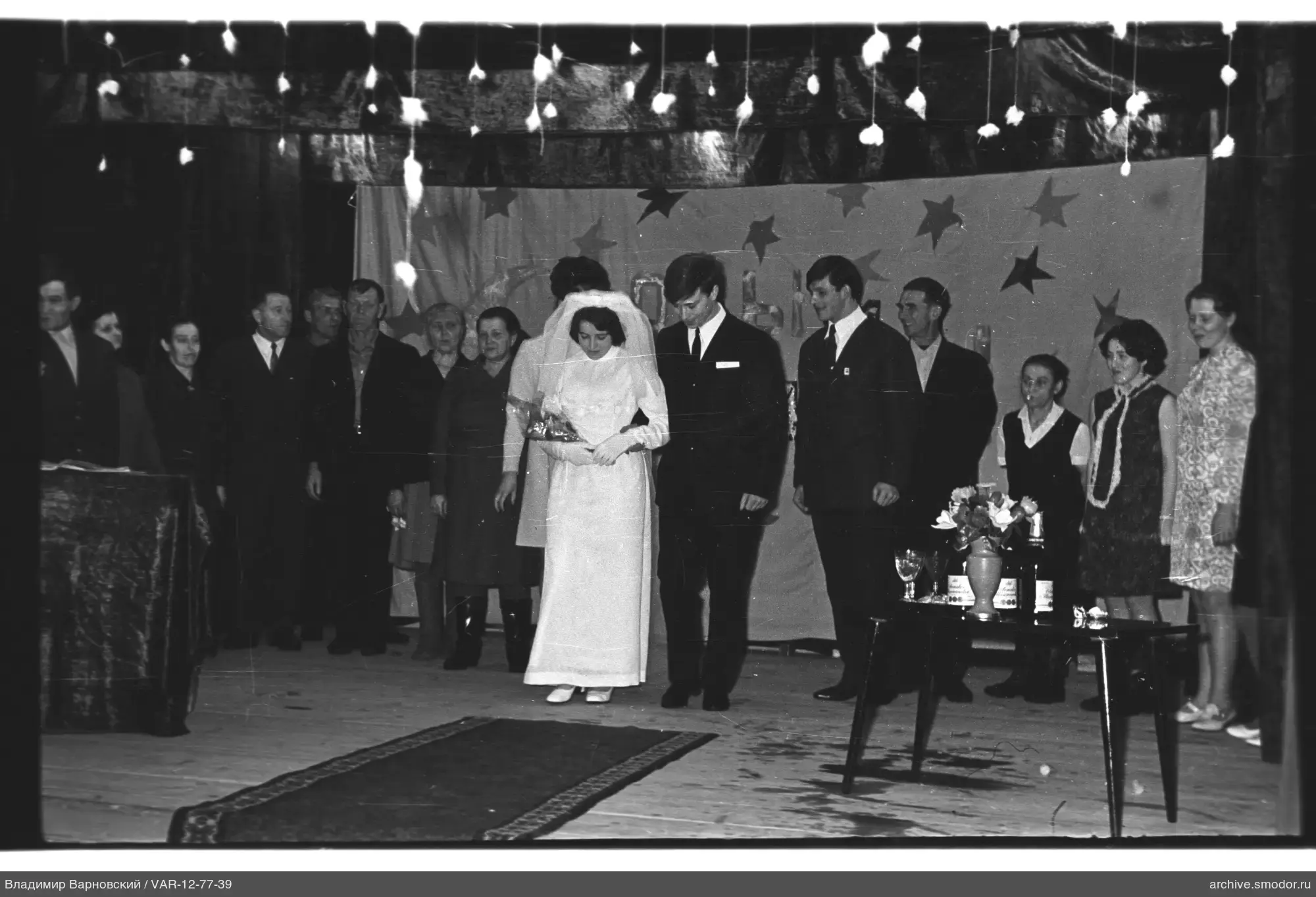 Group portrait with woman in veil