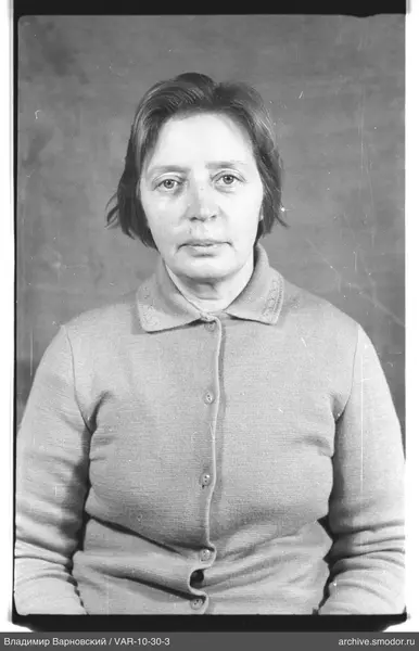 Portrait of a woman in a light cardigan