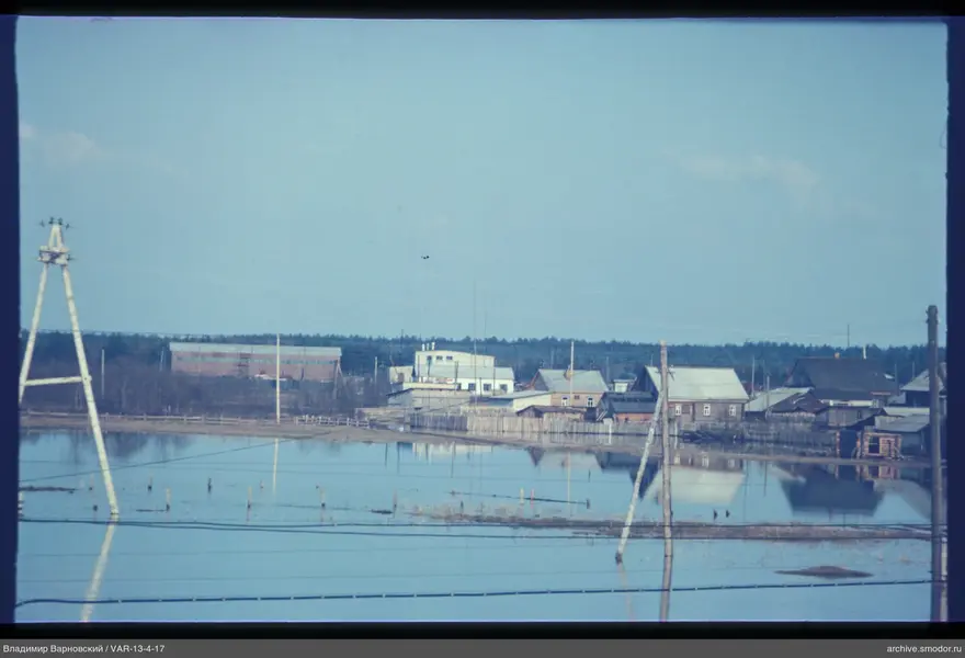Flooded area with power line supports