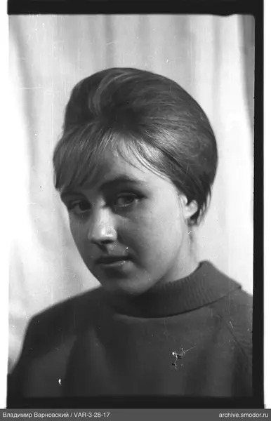 Portrait of a woman with a high hairstyle