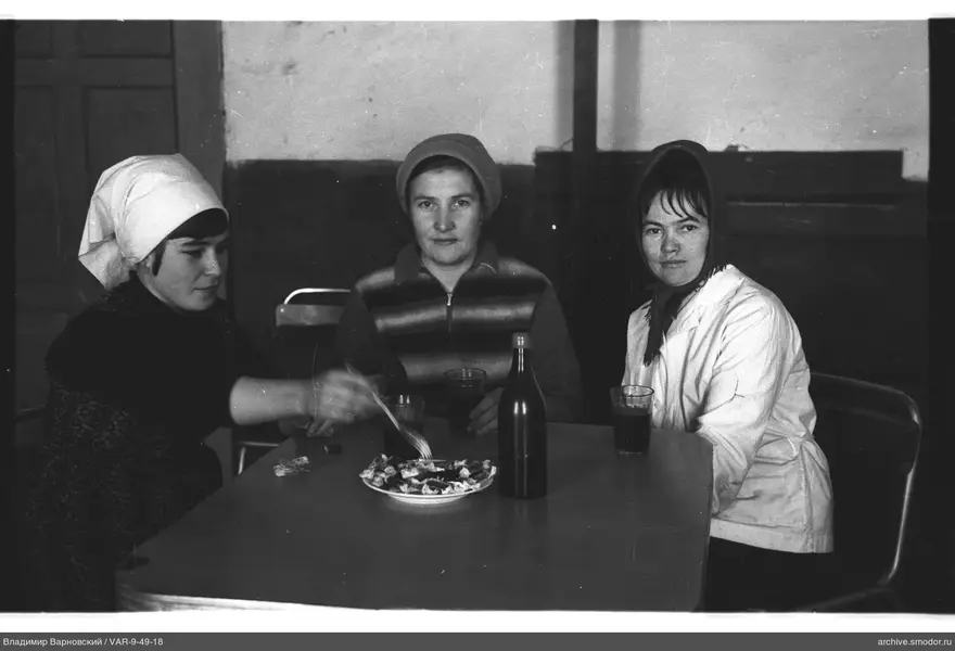 Three women sitting at a table