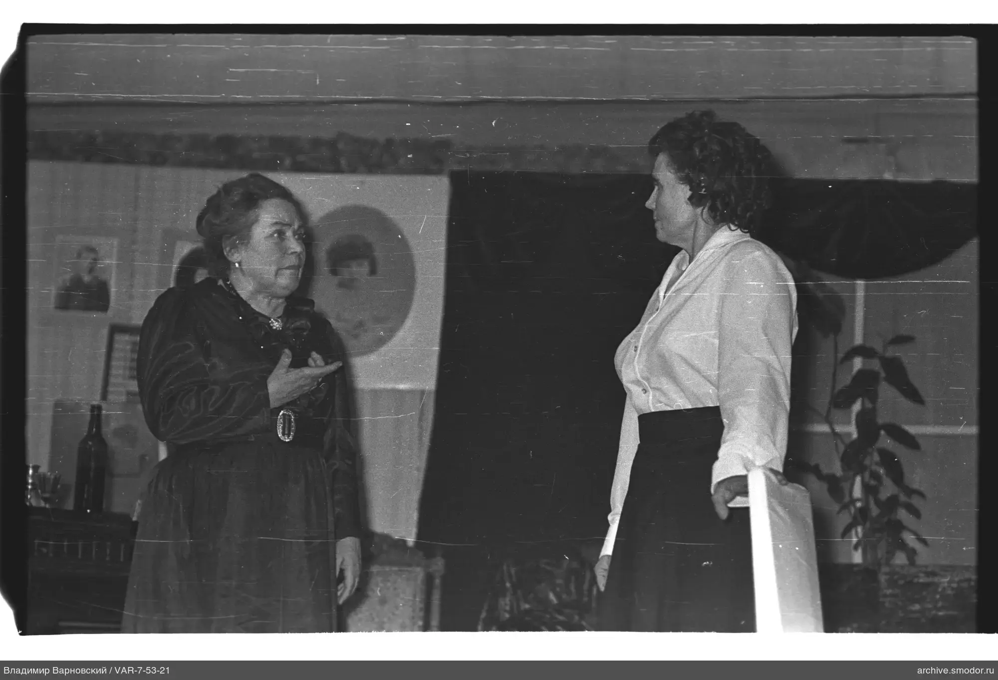 Two women facing each other