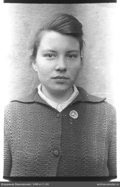 Portrait of a woman in a knitted cardigan