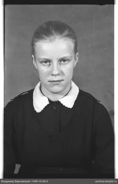 Portrait of a woman in a dark dress