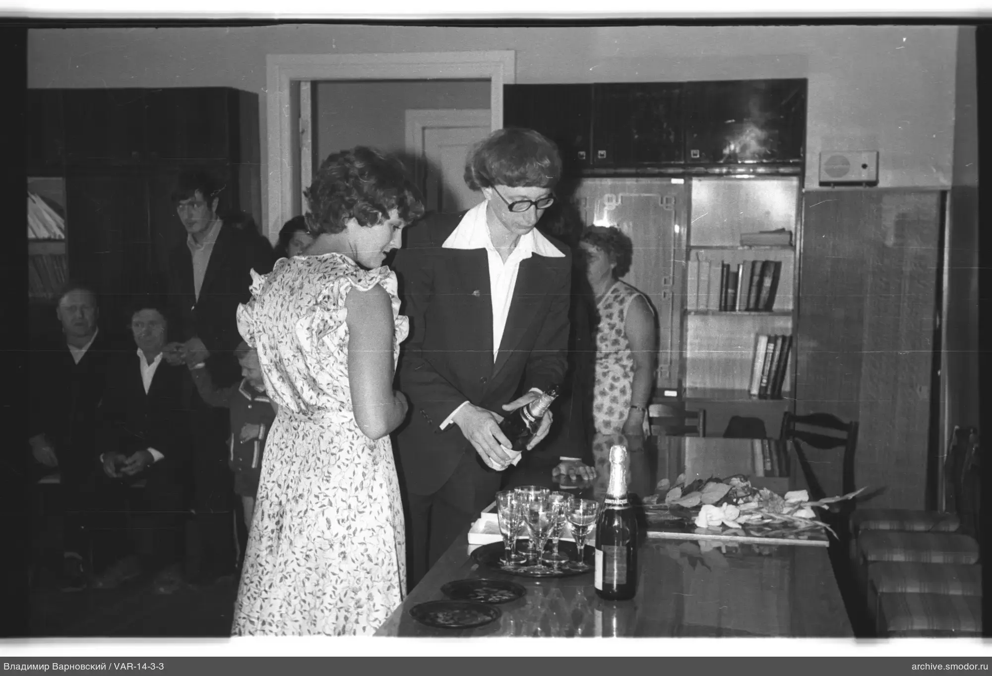 Man pouring drink at an event
