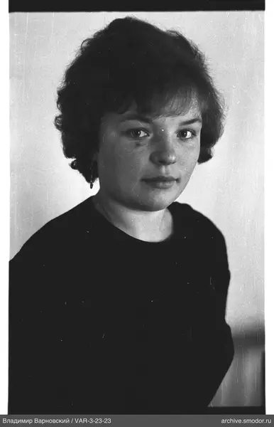 Portrait of a woman in a dark sweater