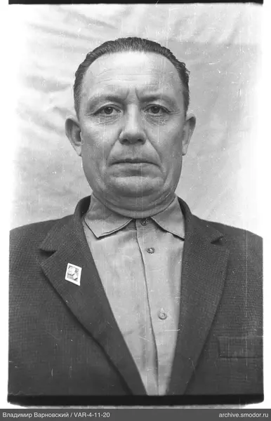 Portrait of a man in a jacket and shirt