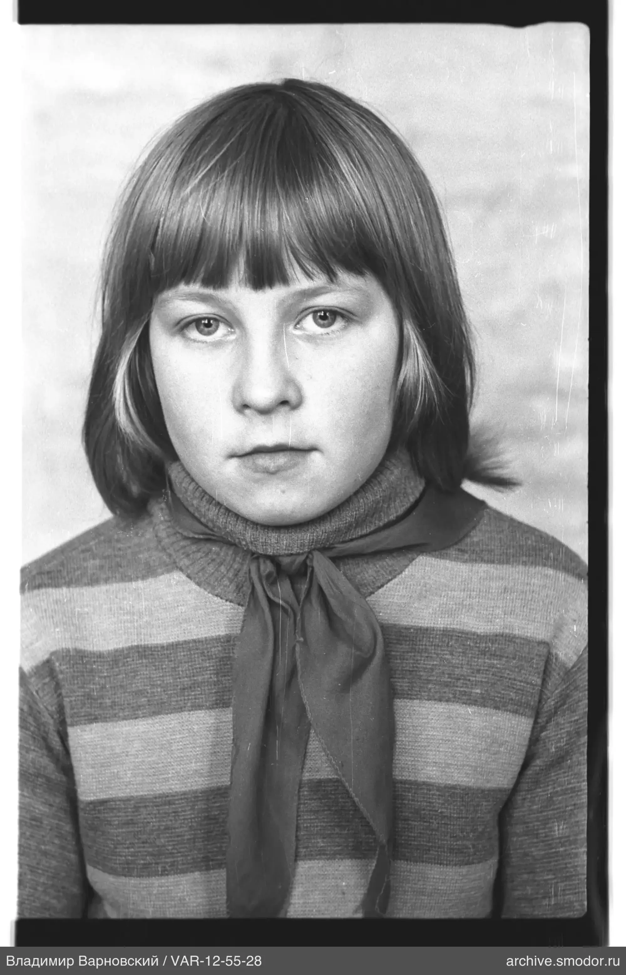 Girl's portrait with striped sweater