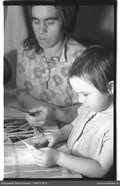 Woman and child at the table