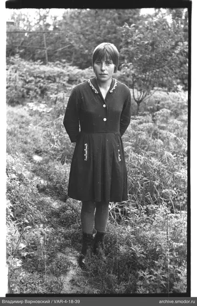 Full-length portrait of a woman on a path