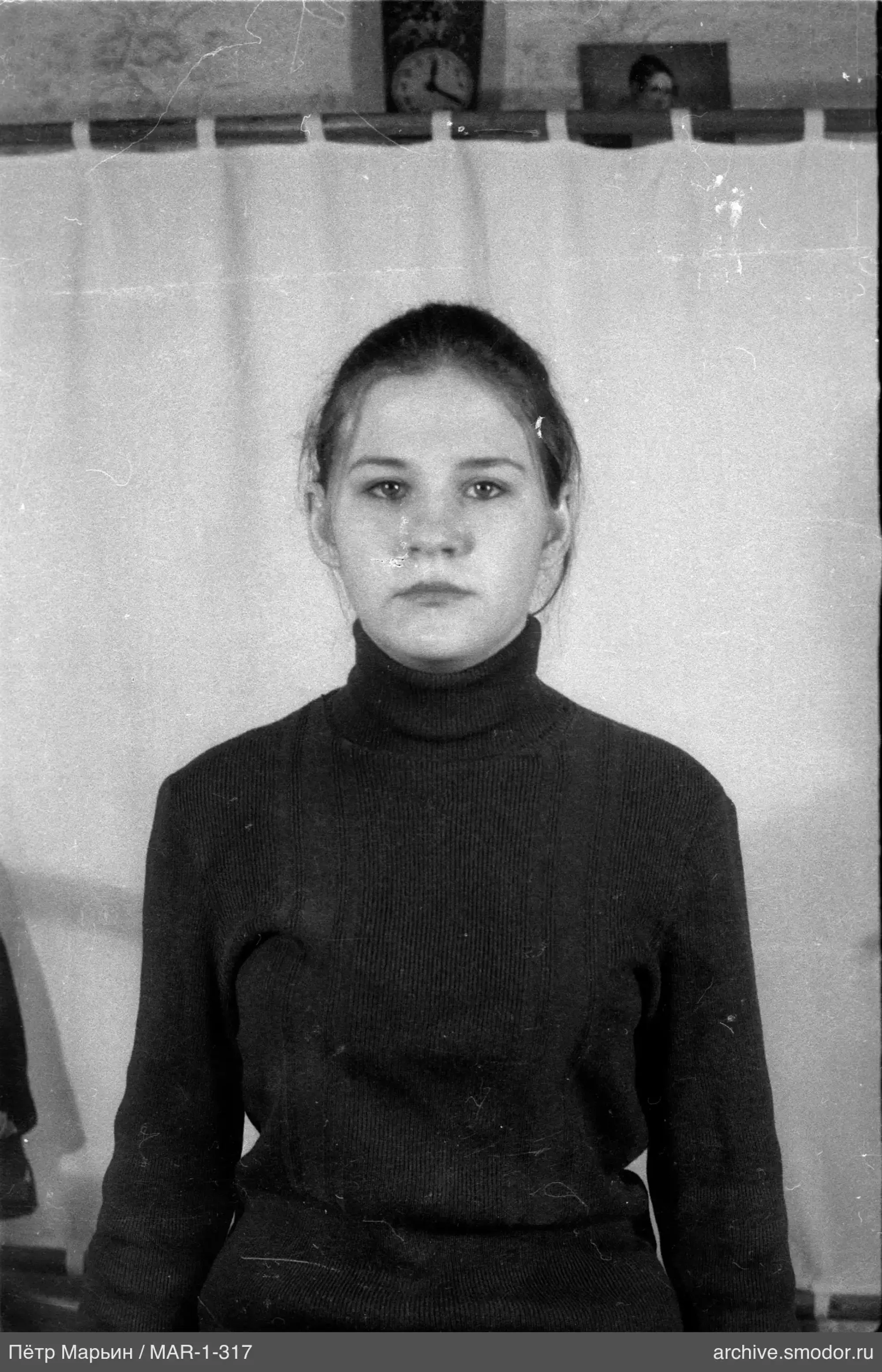 Portrait of a woman in a knitted sweater