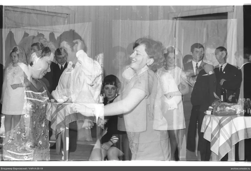 Woman with outstretched hand at event