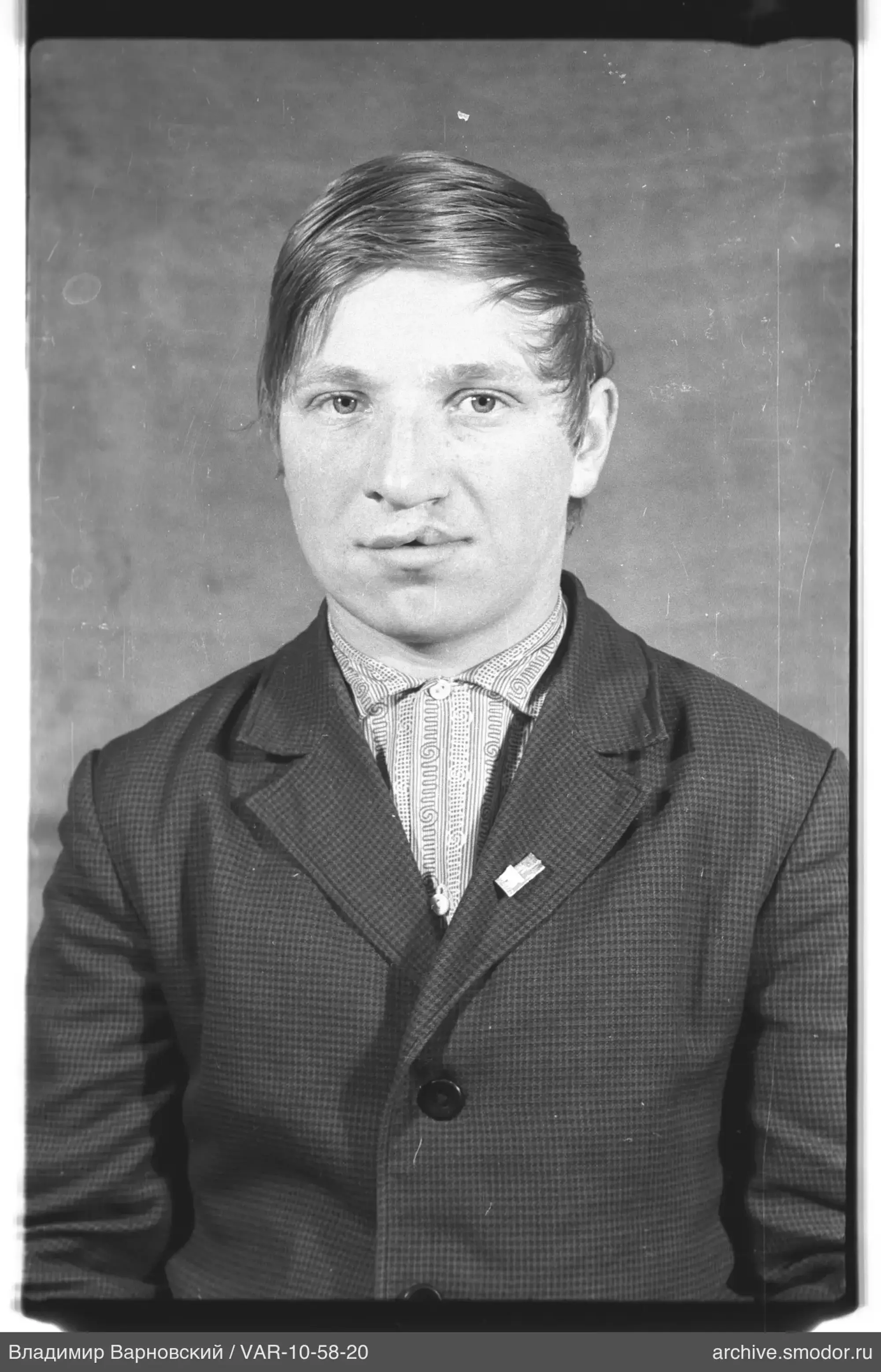Portrait of a man in a jacket and shirt