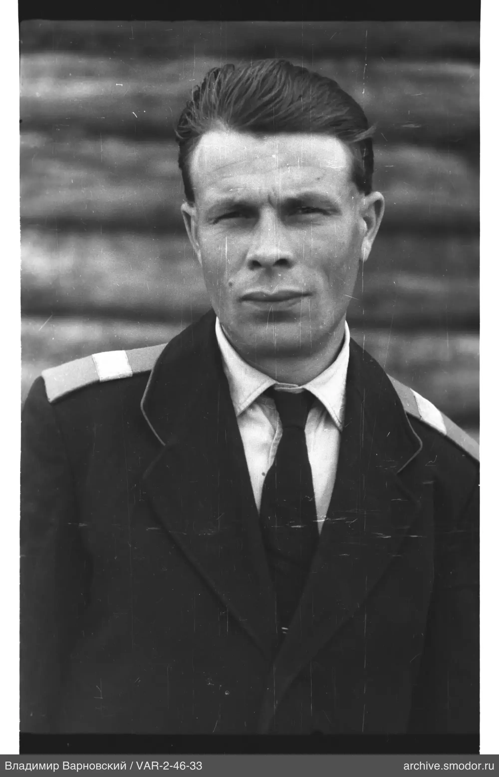 Portrait of a man in a dark coat