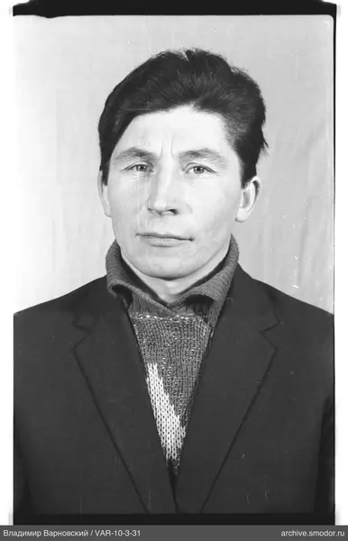 Portrait of a man in dark clothing