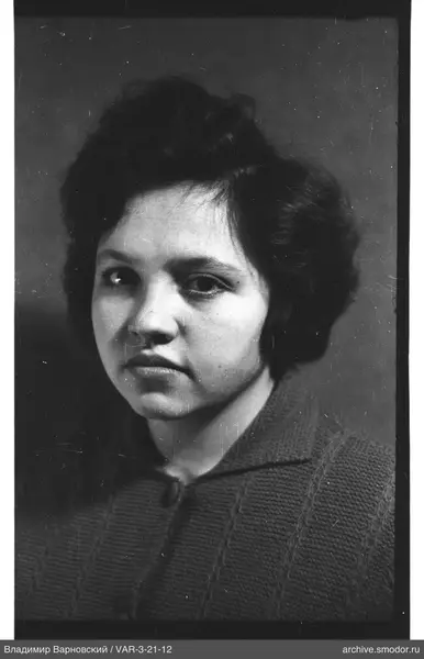 Portrait of a woman in a dark sweater