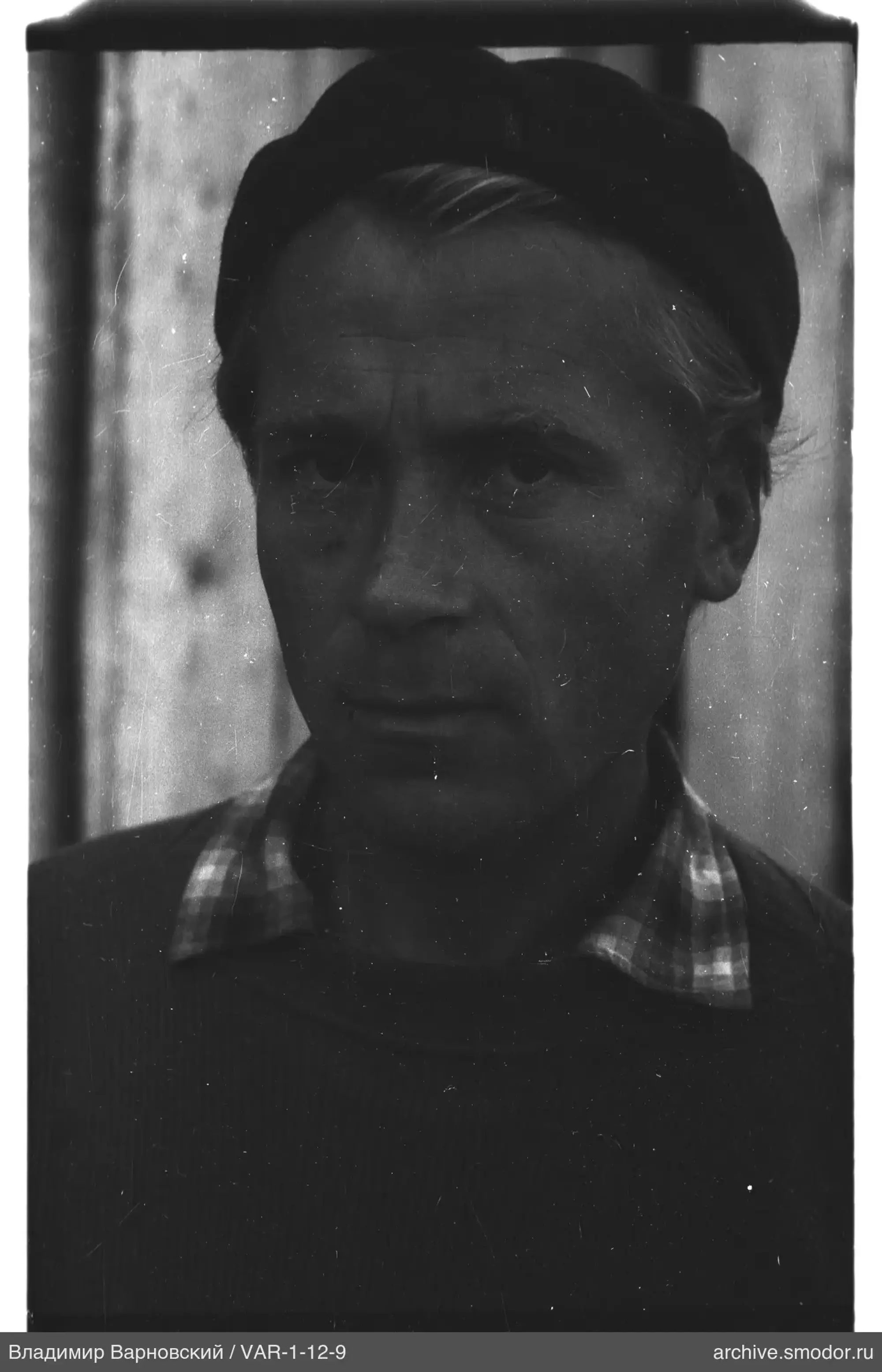 Portrait of a man with a head covering
