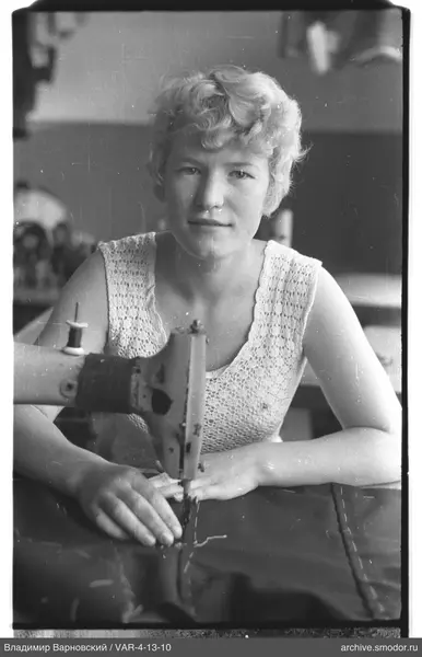 Woman at sewing machine