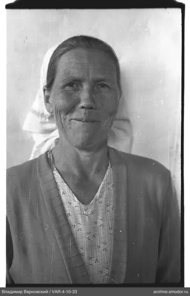 Portrait of a woman with a headscarf