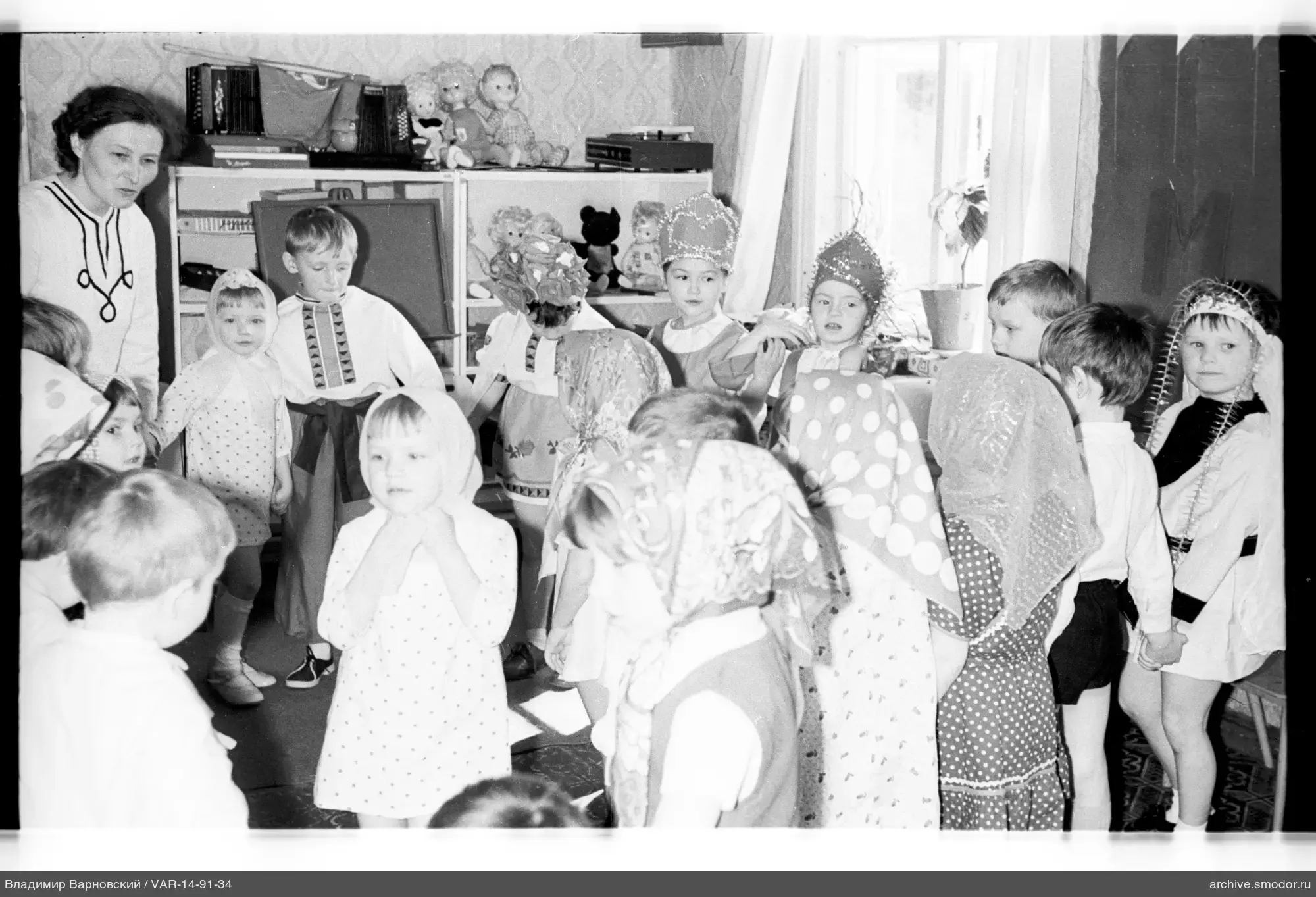 Group of women and children in a room