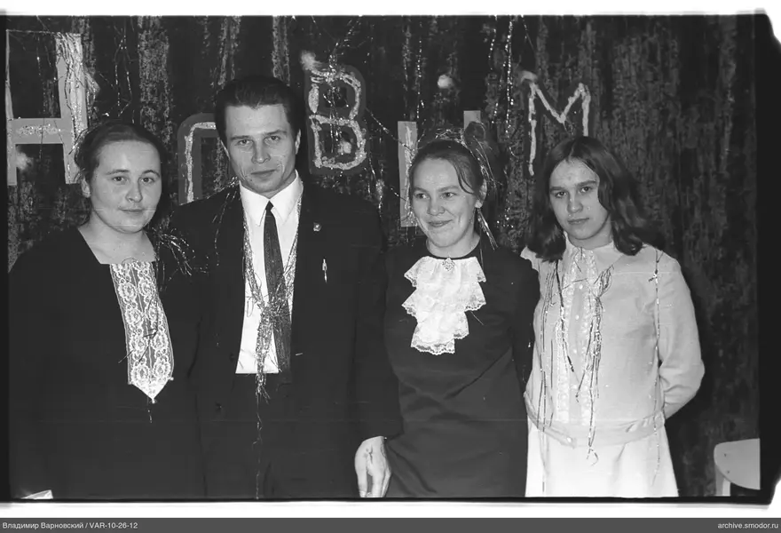Group portrait of four people