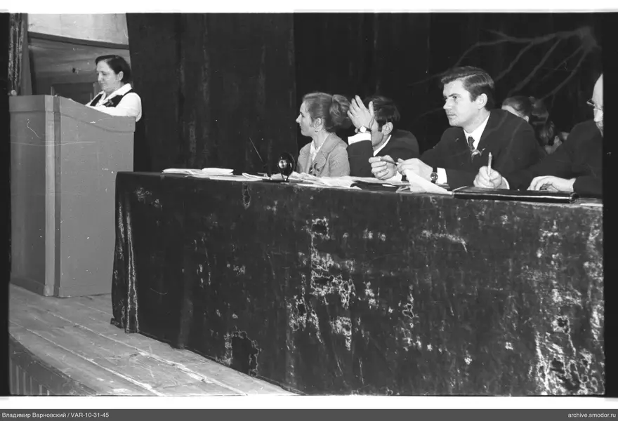 Woman speaking at a podium